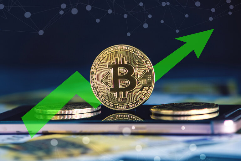 Bitcoin with rising arrow showing fast crypto payouts