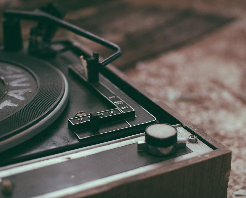 Vintage record player with vinyl album